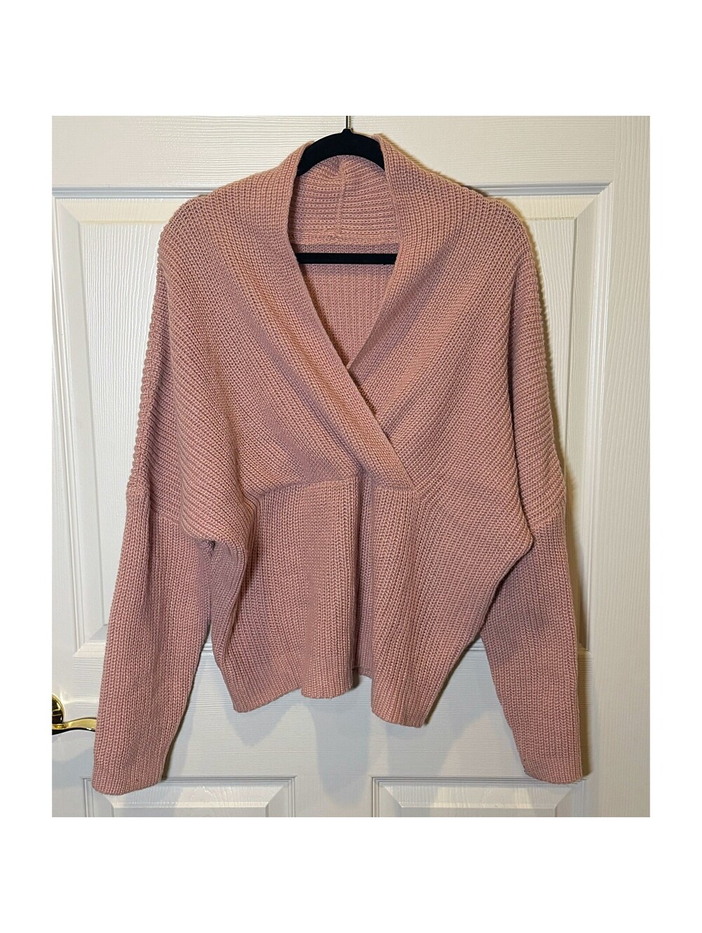 Pink crossover knit sweater